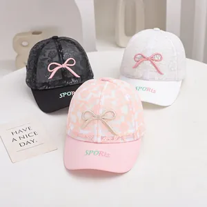 Lace mesh kids baseball caps with bows and sports embroidery in black white and pink