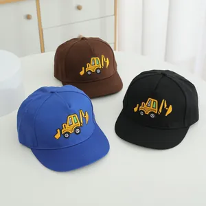 Kids baseball cap featuring cartoon excavator embroidery in brown, blue and black colors