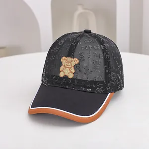 Detail of breathable mesh kids baseball cap featuring cute teddy bear embroidery