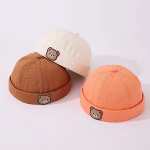 Gorros chinos infantiles con parche de oso en beige, marrón y naranja de 2 a 6 años