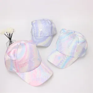 Detail of colorful tie-dye kids baseball cap with cat ears and heart embroidery