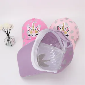 Detailed embroidery of unicorn and silver heart patterns on girls' baseball caps