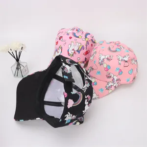Detailed view of kids cartoon unicorn baseball caps with adjustable straps and vibrant prints