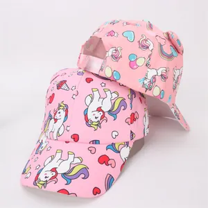 Pink cartoon baseball cap for girls featuring unicorn and rainbow patterns