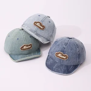Retro denim kids baseball caps with Miami embroidery patches in three blue shades