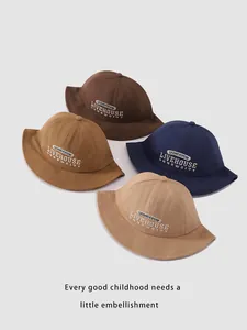 Detail of four colorful kids bucket hats with premium LIVEHOUSE embroidery work