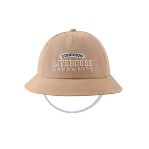 Beige kids cotton bucket hat with blue letter embroidery for boys and girls aged 2-4