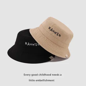 Kids cotton bucket hat with RANHSR letter embroidery in black and beige colors