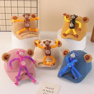 Kids corduroy baseball caps with colorful cartoon monkey puppet and ear embroidery