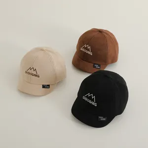 Three children's baseball caps in beige, brown and black with SHSHXIANG embroidery