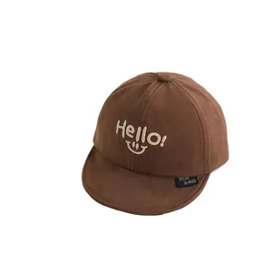 Brown toddler baseball cap with Hello smile embroidery and soft brim for ages 1-4