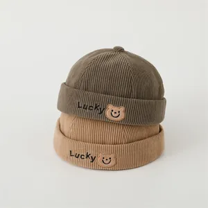 Corduroy baby skull cap with Lucky bear embroidery in army green and khaki colors