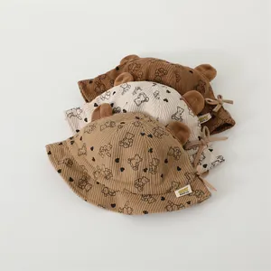 Three corduroy baby bucket hats with cartoon bear patterns and cute 3D bear ears