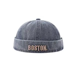 Deep blue denim docker hat with BOSTON embroidery on a clean white background