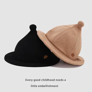 Kids corduroy witch hat with pom-pom detail in black and khaki colors for toddlers