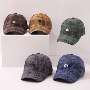 Set of five plaid wool baseball caps with embroidered M logo in various autumn colors