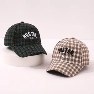 Thick checkered kids baseball caps with vintage Boston embroidery in green and tan
