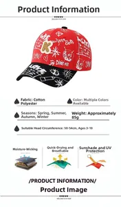 Detailed view of kids' baseball cap showing graffiti print and beige letter K patch