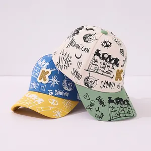 Kids graffiti baseball caps with 3D K letter embroidery and colorful contrast visors