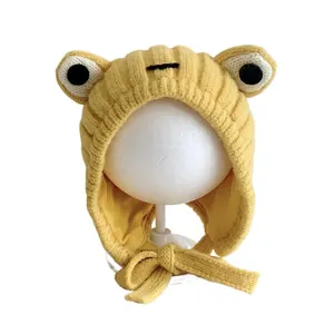 Gelbe Baby Winter-Strickmütze mit Froschaugen und warmen Ohrenschützern für Kinder