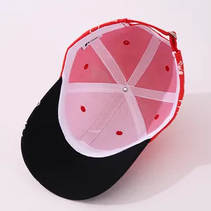 Detailed interior of children baseball cap with adjustable metal buckle and red fabric