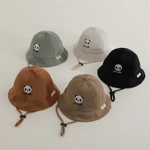 Detailed waffle texture of toddler panda bucket hats with adjustable windproof chin straps