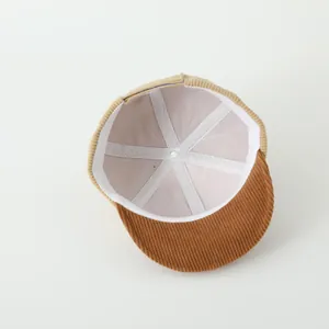 Detailed interior of kids corduroy baseball cap with soft sweatband and stitching