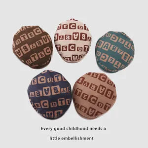 Five-piece set of corduroy baby berets with cute letter patterns in assorted colors