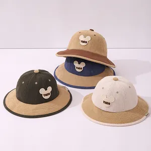 Kids corduroy bucket hats with cartoon bear embroidery in four stylish winter colors