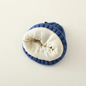 Winter thickened knit baby hat with warm fleece lining and minimalist label design