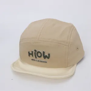 Detail of baby camper hat featuring khaki panel design and 3D HIOW logo embroidery