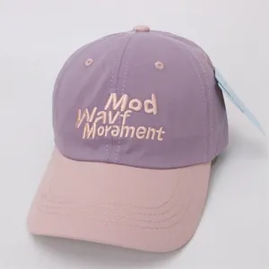 Detail of multi-color kids baseball cap with 3D embroidery and pastel cotton canvas