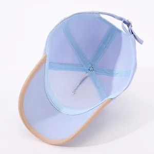 Detail view showing internal reinforced seams, sweatband, and adjustable buckle of the cap
