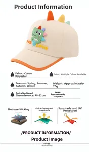 Detail of beige kids baseball cap with 3D dinosaur fin and FOR LOVE embroidery