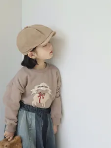 Toddler brown sweatshirt featuring marzipan pig embroidery and matching beret hat detail