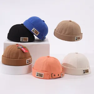 Vue détaillée des bonnets docker vintage pour enfants en maille gaufrée en six couleurs