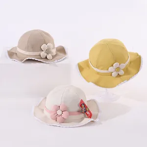 Three colors of kids lace sun hats featuring floral appliques and breathable fabric