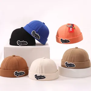 Detailed close-up of colorful cotton docker hats with Barton embroidery for kids