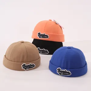 Multi-color cotton miki hats for kids featuring Barton 3VF embroidered patches