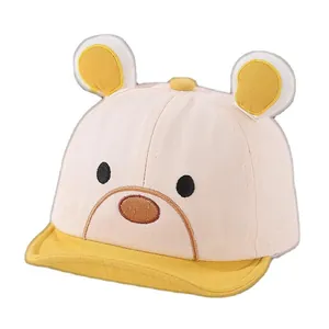 Cute baby bear baseball cap with cartoon ears and patchwork design for spring sun protection