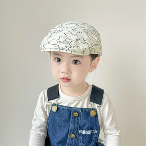 Béret enfant minimaliste en coton beige avec imprimé dinosaure et style décontracté