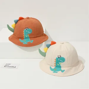 Cartoon dinosaur bucket hats for kids in orange and beige with 3D colorful spikes