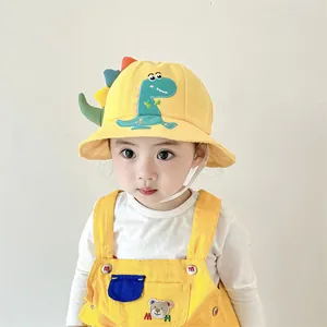 Kids yellow cartoon dinosaur bucket hat with sun protection and windproof chin strap