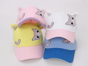 Detail of colorful kids baseball caps with sequin cat embroidery and 3D ear accents