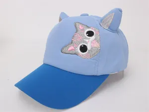 Detail of blue kids baseball cap with 3D cat ears and sequined feline embroidery