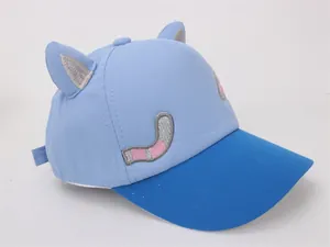 Detail of blue kids baseball cap with 3D cat ears and cute feline embroidery