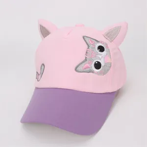 Detail of pink and purple children's baseball cap with 3D cat ears and embroidery