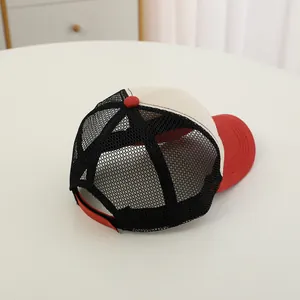 Detail view of the breathable mesh back and adjustable strap on the kids' baseball cap
