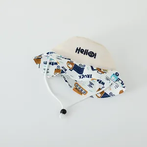 Close-up of kids mesh sun hat with Hello embroidery and cartoon truck patterns