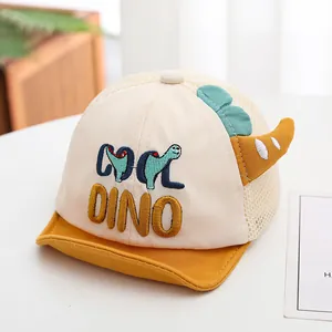 Detail of mesh baby baseball cap with Cool Dino embroidery and 3D decorative horns